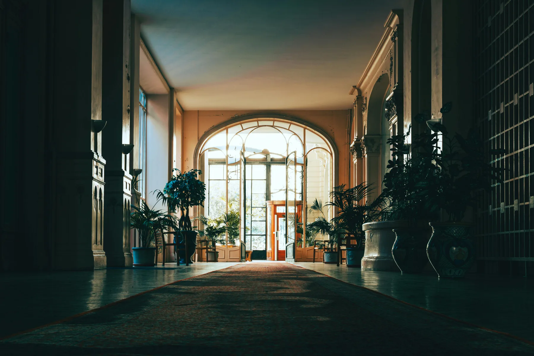 Quiet hallway with warm light, clean lines, and a clear path through the home
