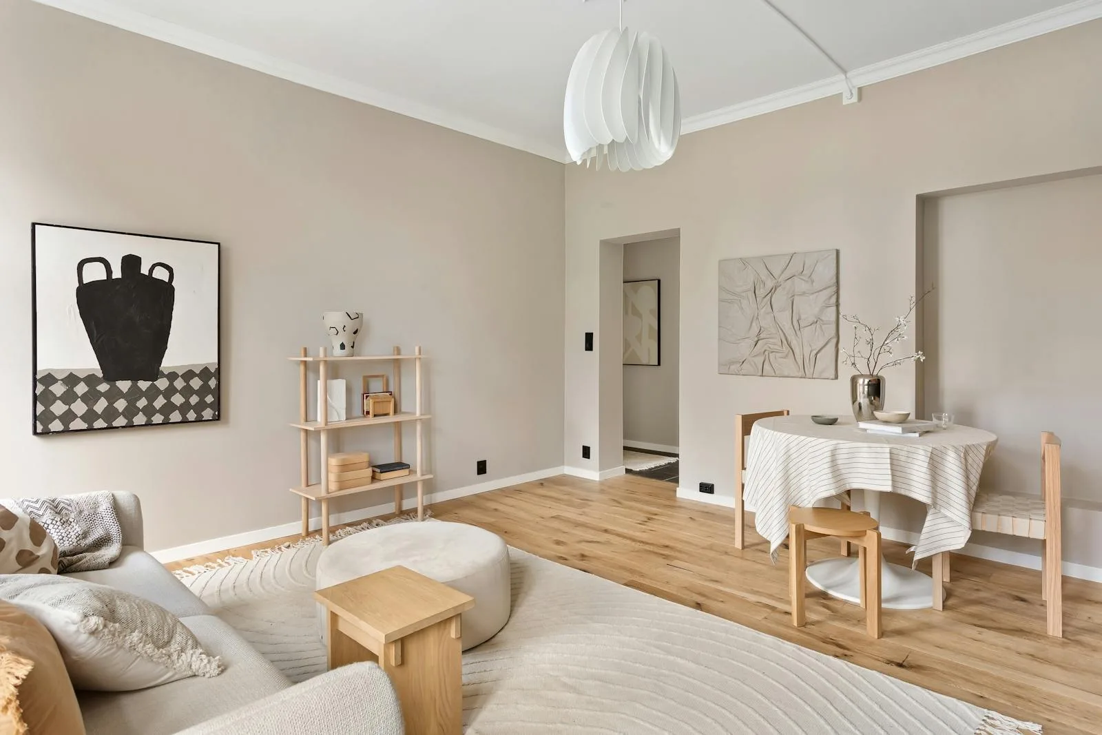 Calm beige living room with soft natural light and a warm healthy-feeling palette
