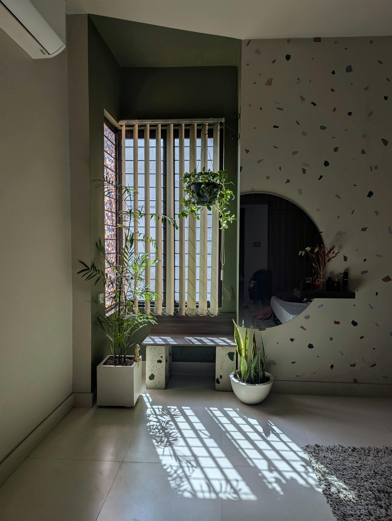 Calm interior with shelving, soft decor, and warm natural light