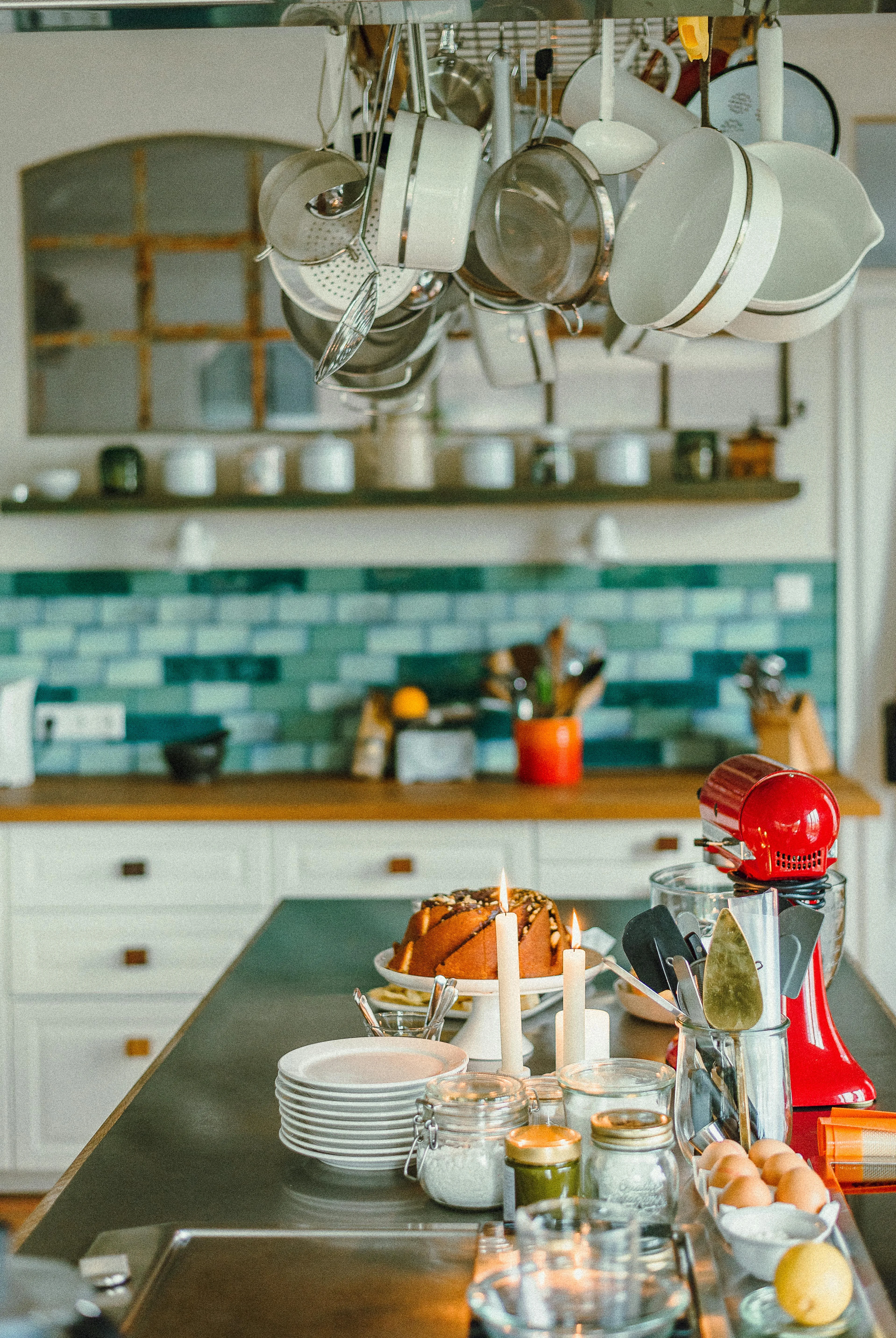 Kitchen counter with several everyday appliances and a denser working setup